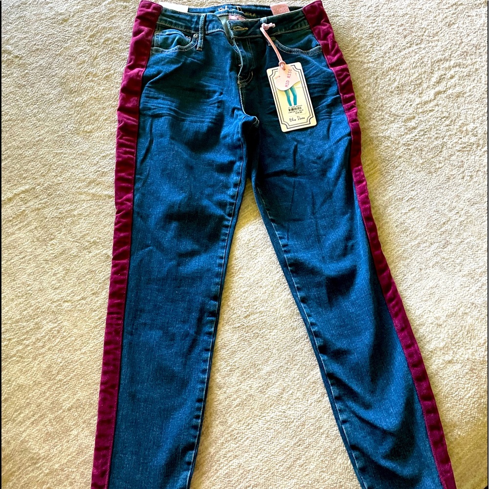 Skinny jeans with burgundy velvet stripe. Mid rise. Size 9.